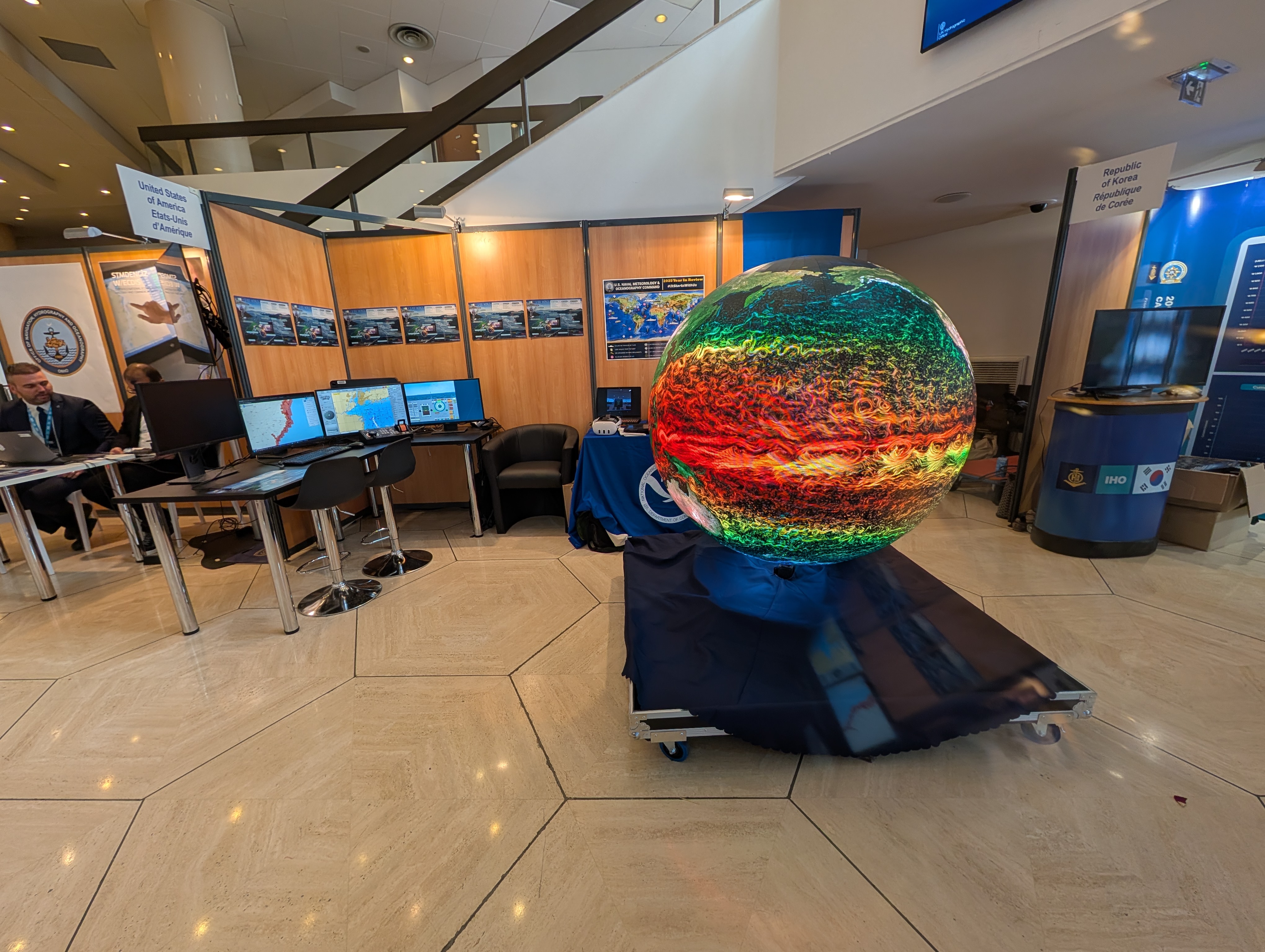Control station and AYNI spherical LED display at an international exhibition