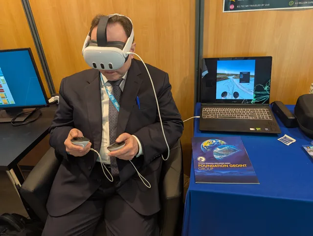 AYNI XR headset demonstration at a booth